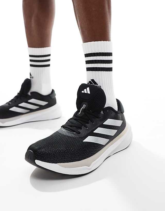 asos adidas Running Supernova Stride trainers in black