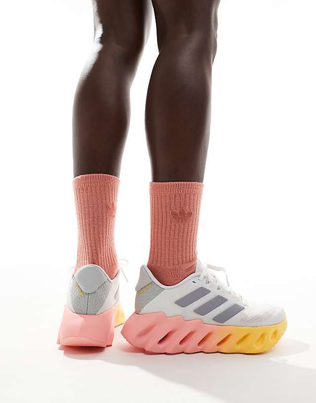 asos adidas Running Switch FWD 2 trainers in white and orange