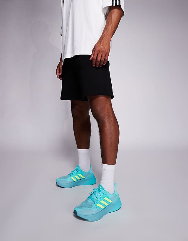 asos adidas Running Ultraboost 5 trainers in blue and lime