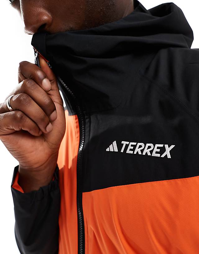 Asos Adidas Terrex Outdoors Waterproof Jacket In Orange And Black
