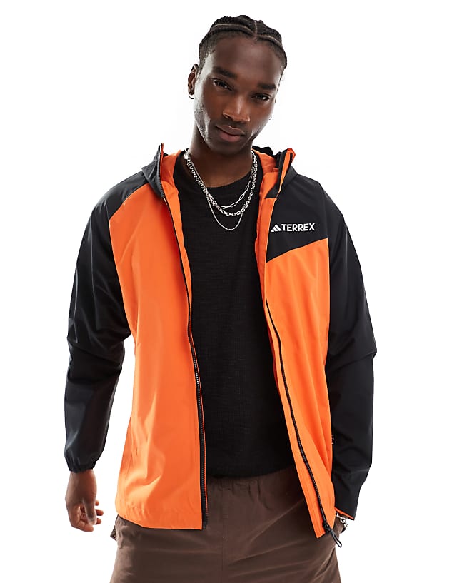 asos adidas Terrex outdoors waterproof jacket in orange and black