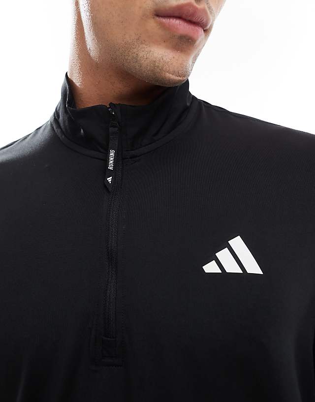 Asos Adidas Training Own The Run 1/4 Zip Top In Black