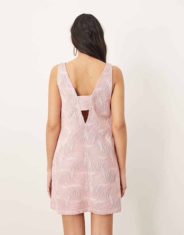 Asos ARRANGE Wave Textured Plunge Mini Dress In Baby Pink