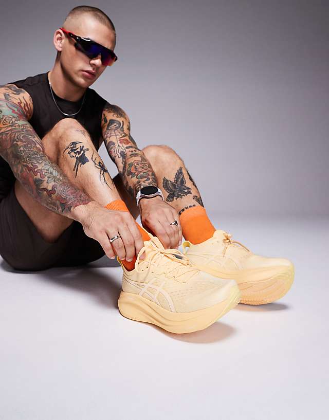 asos Asics Gel-Nimbus 27 Lite-Show running trainers in lite-show and light orange