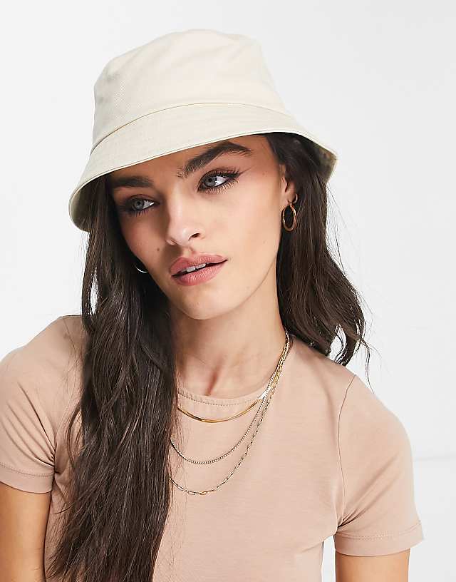 asos ASOS DESIGN canvas bucket hat in ecru asos ASOS DESIGN canvas bucket hat in ecru