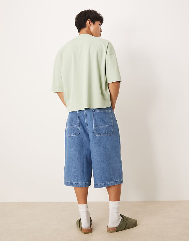 Asos ASOS DESIGN Oversized Denim Jorts In Mid Wash