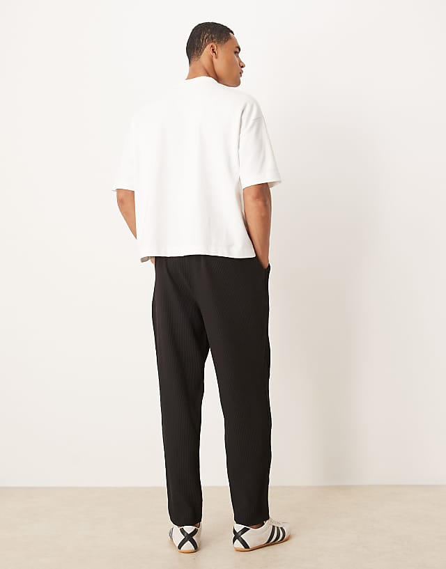 Asos ASOS DESIGN Plisse Tapered Trousers In Black
