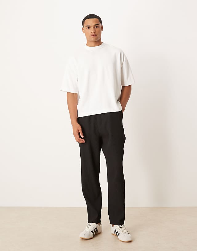 asos ASOS DESIGN plisse tapered trousers in black