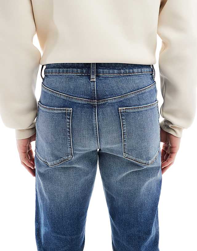 Asos ASOS DESIGN Slim Jeans In Mid Wash Blue