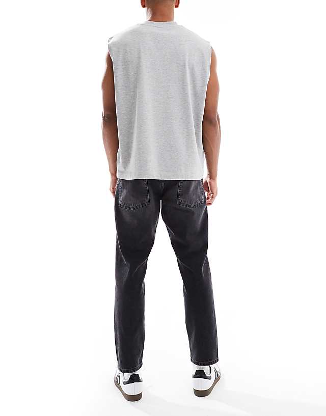 Asos ASOS DESIGN Tapered Fit Jeans In Washed Black