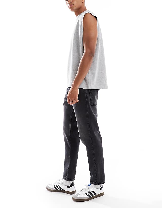 Asos ASOS DESIGN Tapered Fit Jeans In Washed Black