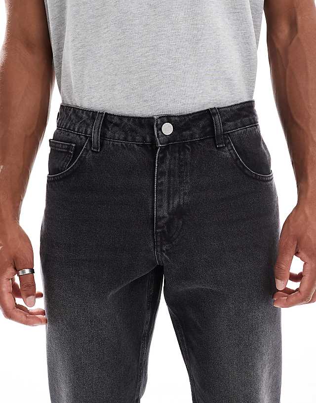 Asos ASOS DESIGN Tapered Fit Jeans In Washed Black