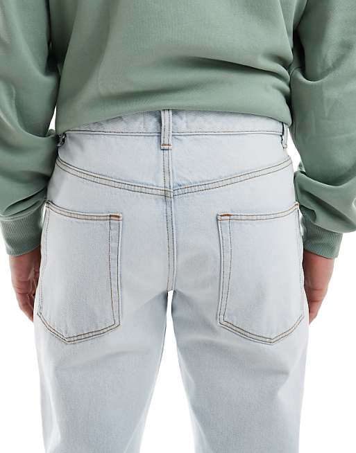 Asos ASOS DESIGN Tapered Jeans In Bleach Wash Blue