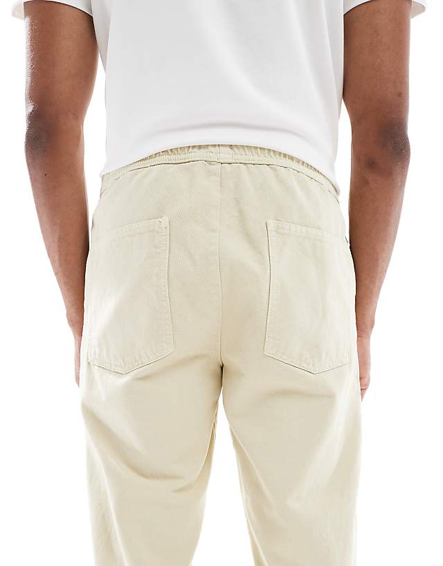 Asos ASOS DESIGN Tapered Pull On Chinos In Beige
