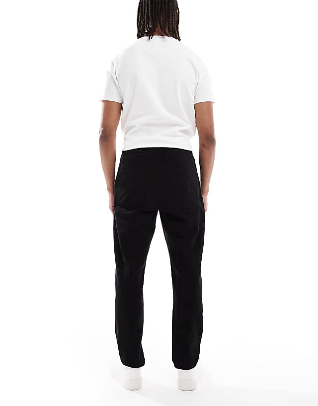 Asos ASOS DESIGN Tapered Pull On Chinos In Black