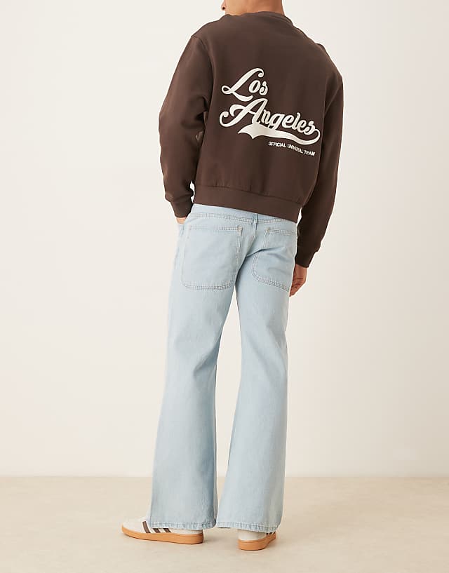 Asos ASOS DESIGN Wide Flare Jeans In Bleached Blue