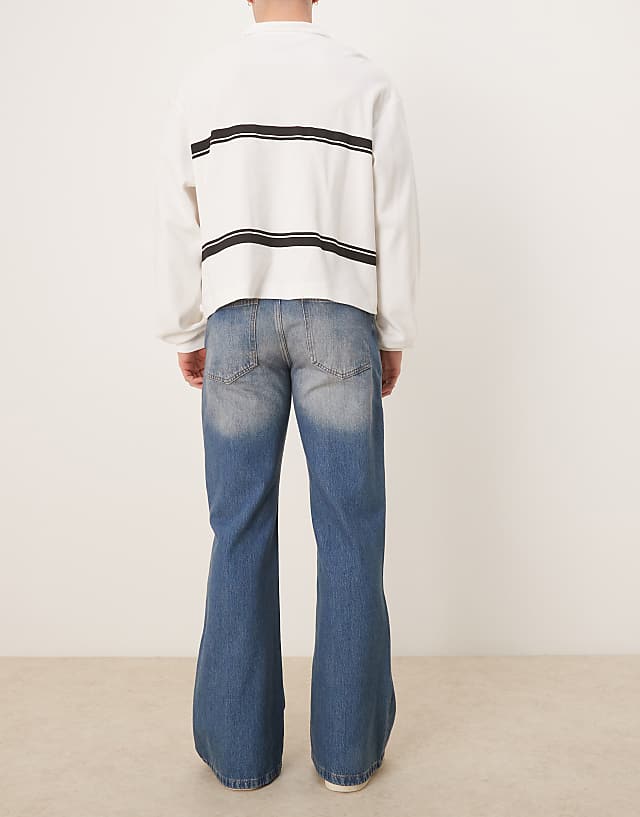 Asos ASOS DESIGN Wide Flare Jeans In Tinted Wash