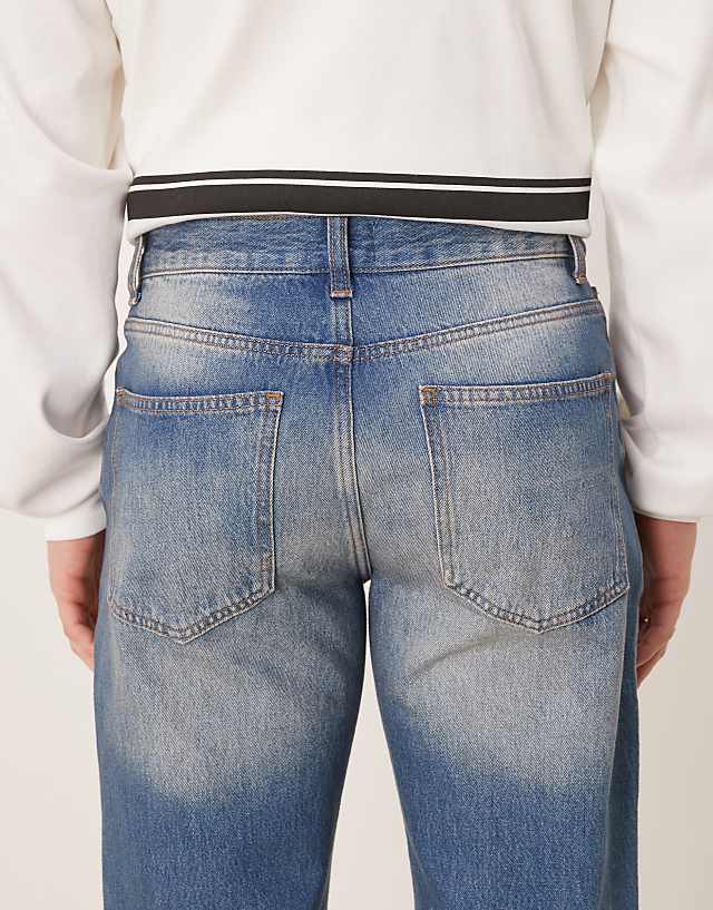Asos ASOS DESIGN Wide Flare Jeans In Tinted Wash
