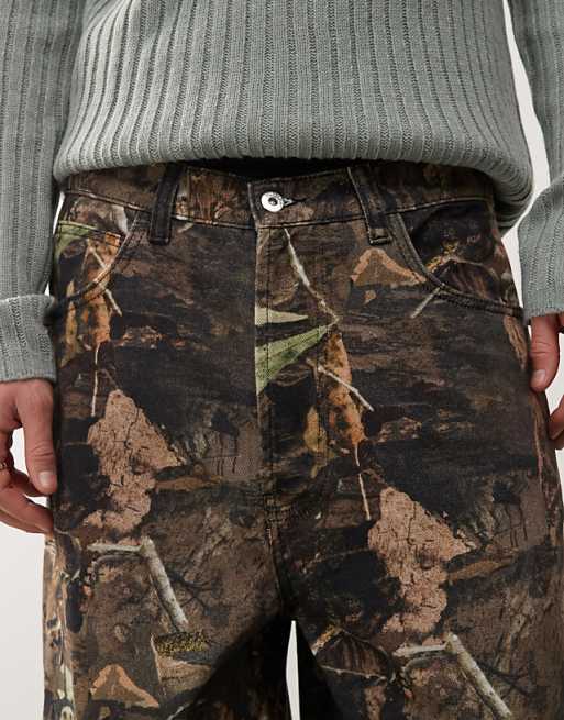 Asos COLLUSION X002 Baggy Jeans In Tree Camo Print