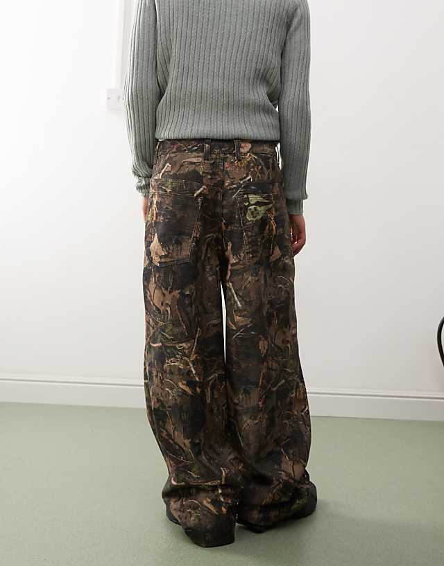 Asos COLLUSION X002 Baggy Jeans In Tree Camo Print
