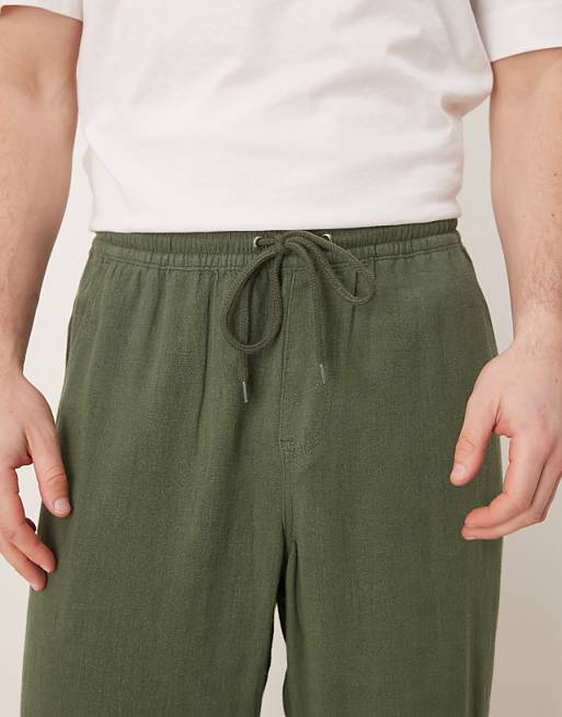 Asos ASOS DESIGN Baggy Fit Pull On Linen Rich Trouser In Dark Green