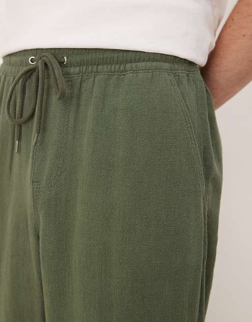 Asos ASOS DESIGN Baggy Fit Pull On Linen Rich Trouser In Dark Green