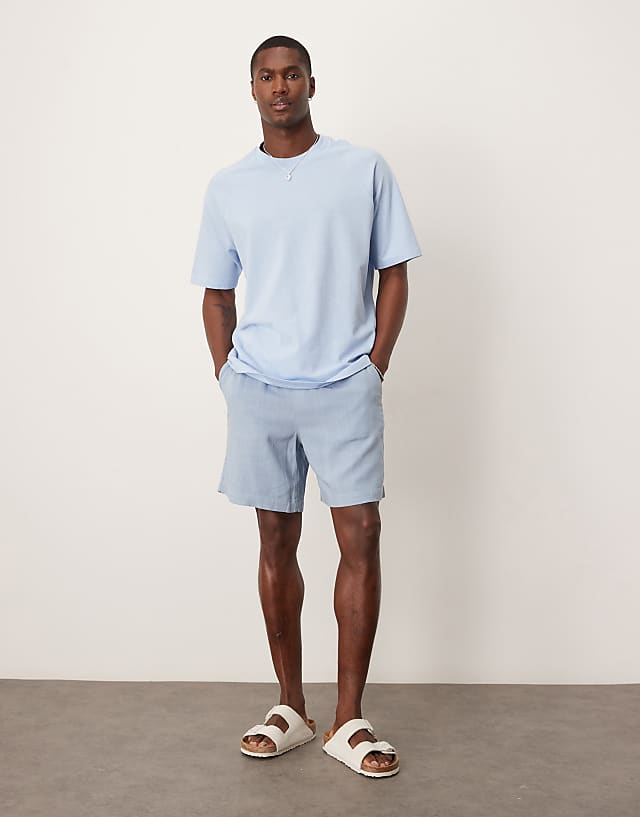 asos ASOS DESIGN baggy pull on shorts in blue linen rich