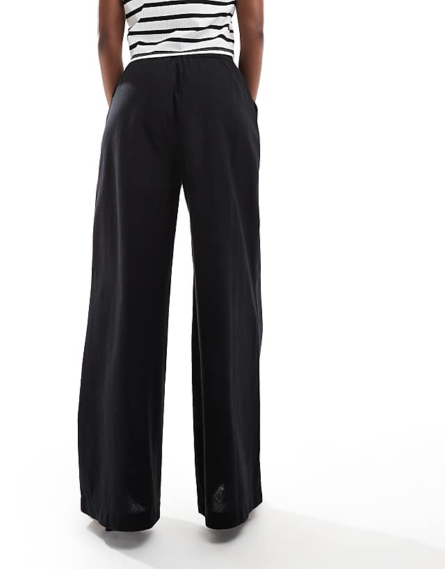 Asos ASOS DESIGN Bias Cut Relaxed Trouser With Linen In Black