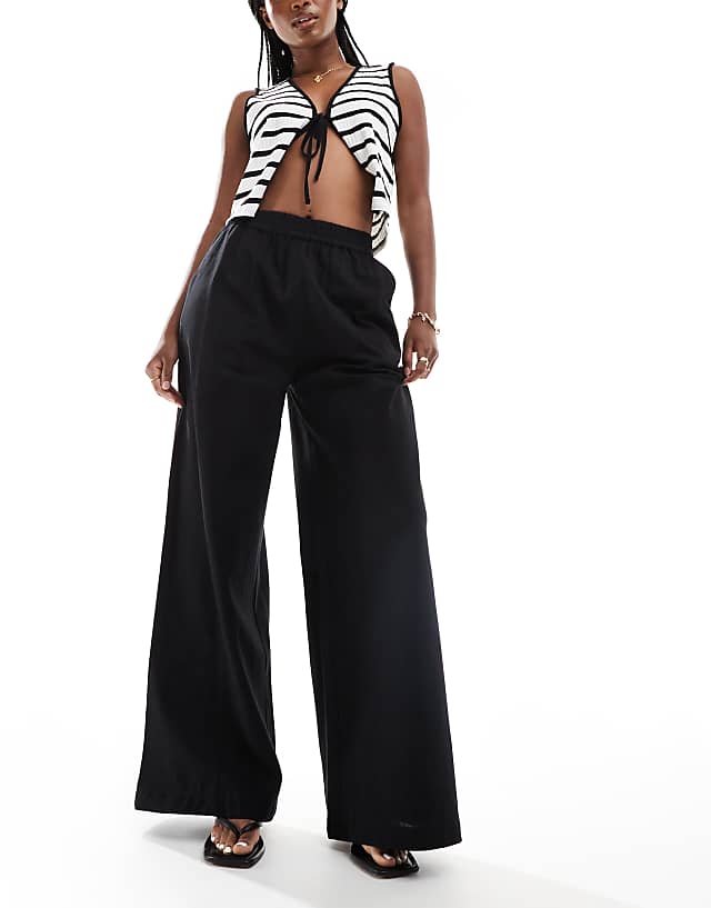Asos ASOS DESIGN Bias Cut Relaxed Trouser With Linen In Black
