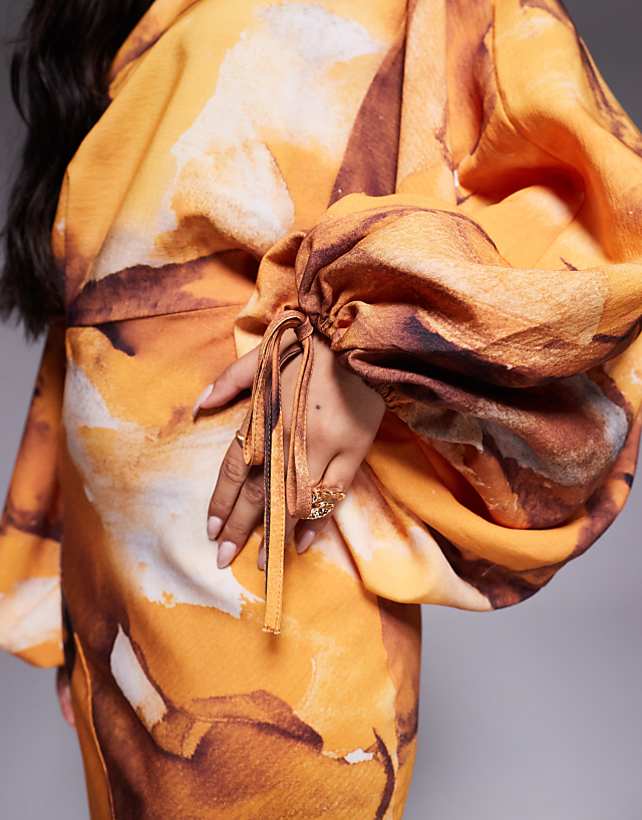Asos ASOS DESIGN Blouson Sleeve Tucked Maxi Dress With Tie Detail In Rust Oversized Floral