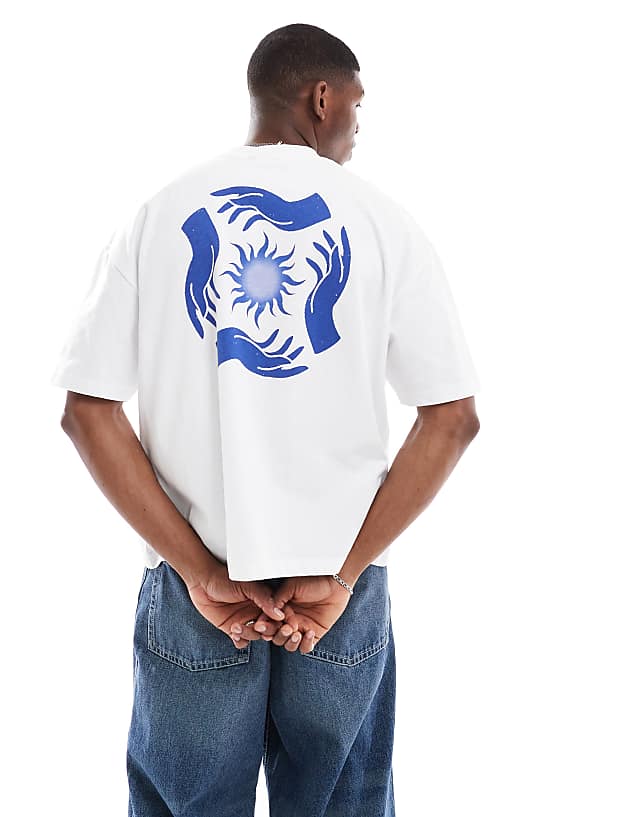 asos ASOS DESIGN boxy dropped shoulder oversized t-shirt with celestial graphic in white