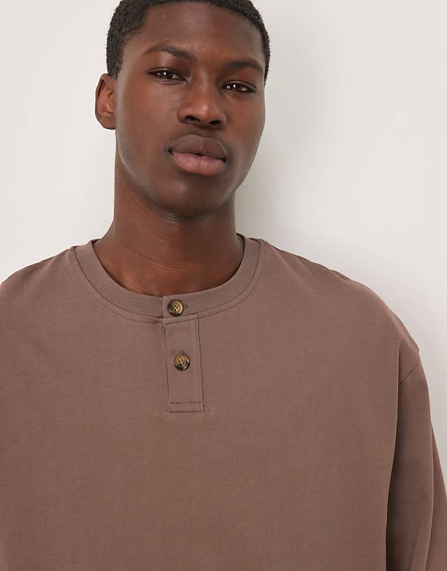 Asos ASOS DESIGN Boxy Oversized Long Sleeve Henley T-shirt In Washed Black