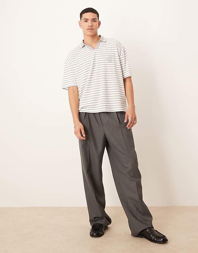 Asos ASOS DESIGN Boxy Oversized Polo With Chest Logo In Blue And White Ribbed Stripe
