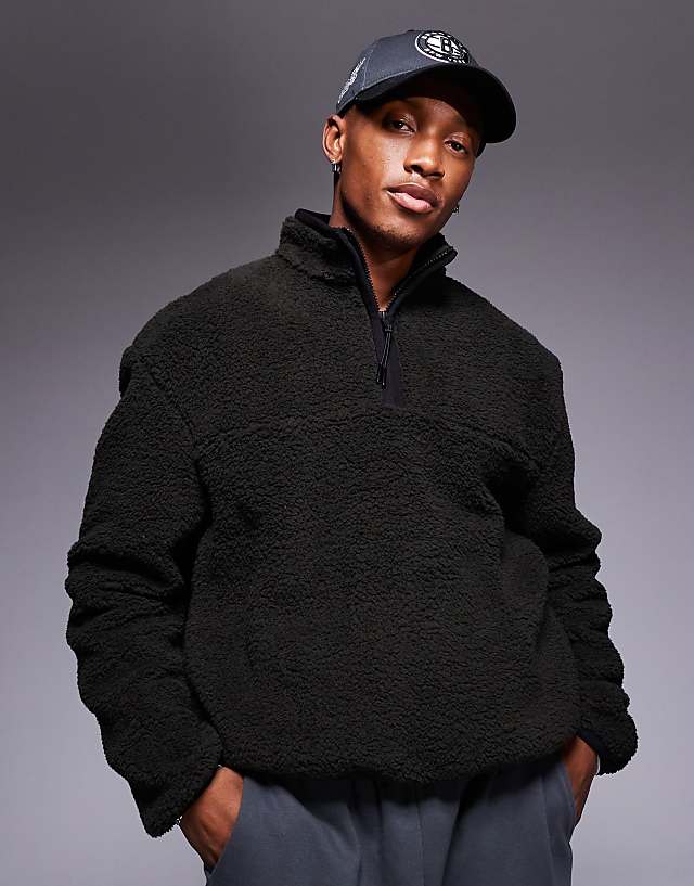 asos ASOS DESIGN boxy oversized quarter zip borg sweatshirt in khaki