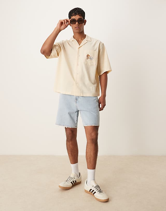 Asos ASOS DESIGN Boxy Oversized Revere Shirt With Chest Embroidery In Beige