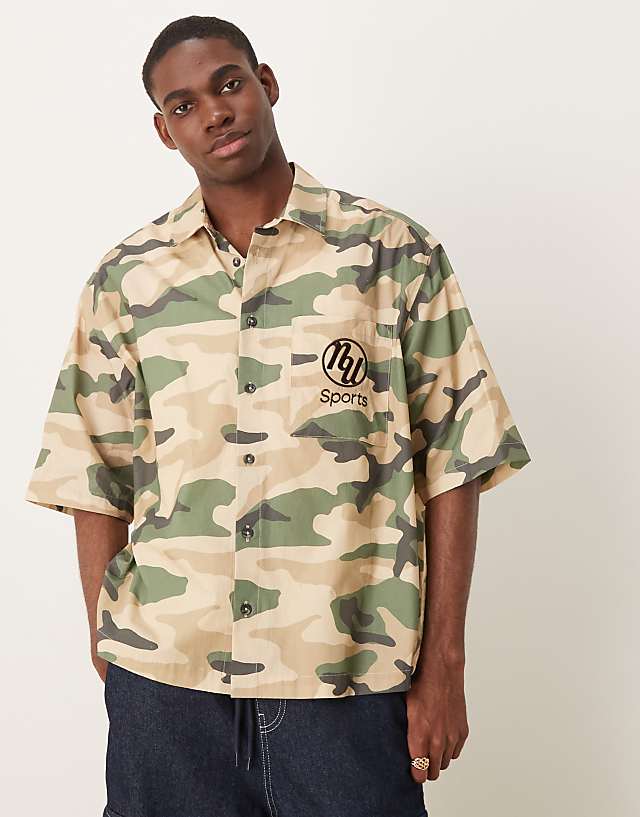 asos ASOS DESIGN boxy oversized shirt with chest embroidery in camo print
