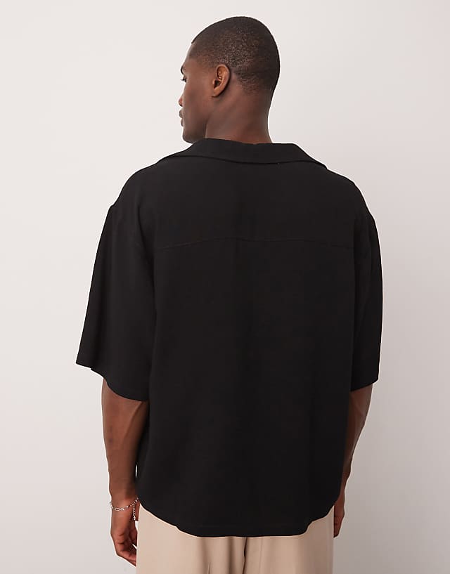 Asos ASOS DESIGN Boxy Oversized Shirt With Deep V Neck In Black