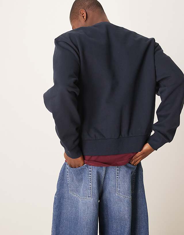 Asos ASOS DESIGN Boxy Oversized Sweatshirt With Chest Embroidery In Navy