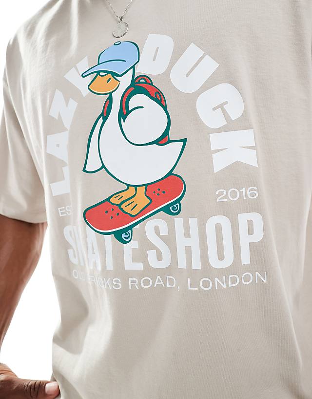 Asos ASOS DESIGN Boxy Oversized T-shirt In With Cartoon Graphic In Stone