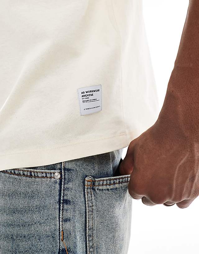 Asos ASOS DESIGN Boxy Oversized T-shirt With Applique Graphic In Buttermilk