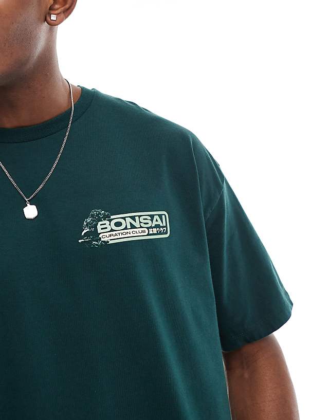 Asos ASOS DESIGN Boxy Oversized T-shirt With Bonsai Graphic In Dark Green