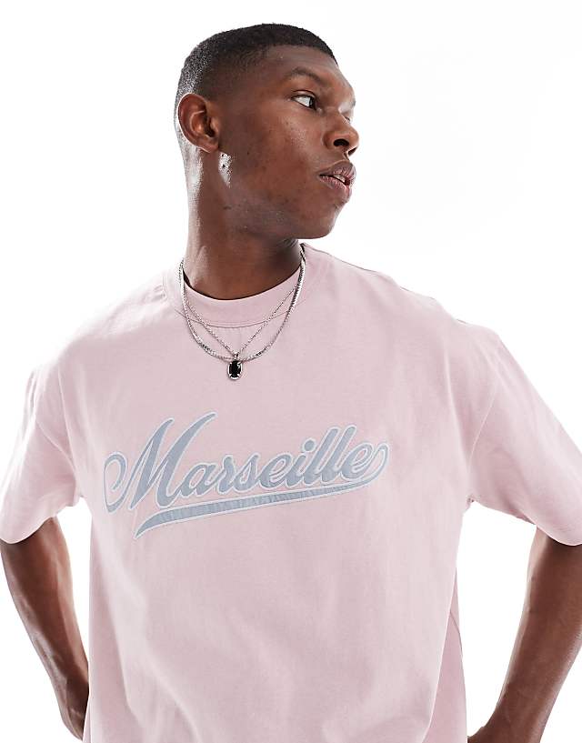 Asos ASOS DESIGN Boxy Oversized T-shirt With City Text Applique In Light Pink