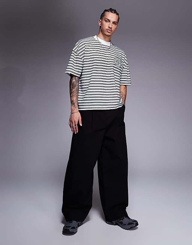 Asos ASOS DESIGN Boxy Oversized T-shirt With Dropped Shoulder And Chest Embroidery In Black And White Stripe