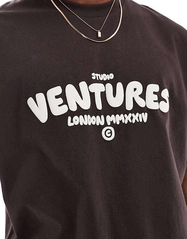 Asos ASOS DESIGN Boxy Oversized T-shirt With Text Graphic In Brown