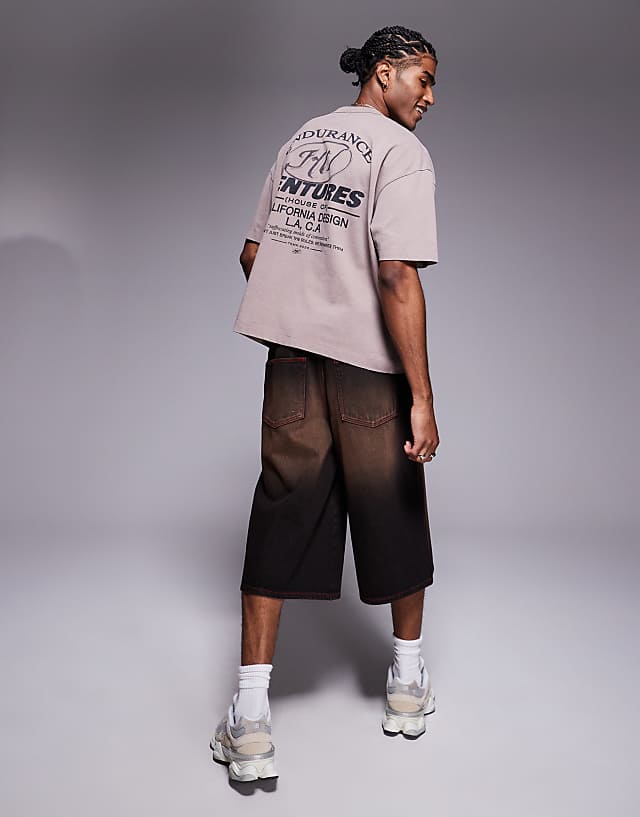 Asos ASOS DESIGN Boxy Oversized T-shirt With Text Graphic In Washed Brown