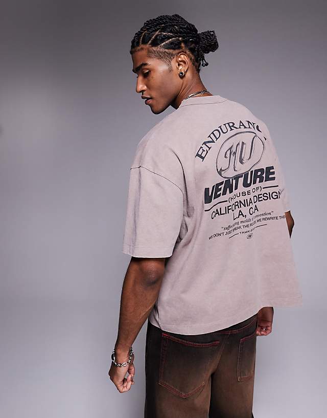 asos ASOS DESIGN boxy oversized t-shirt with text graphic in washed brown