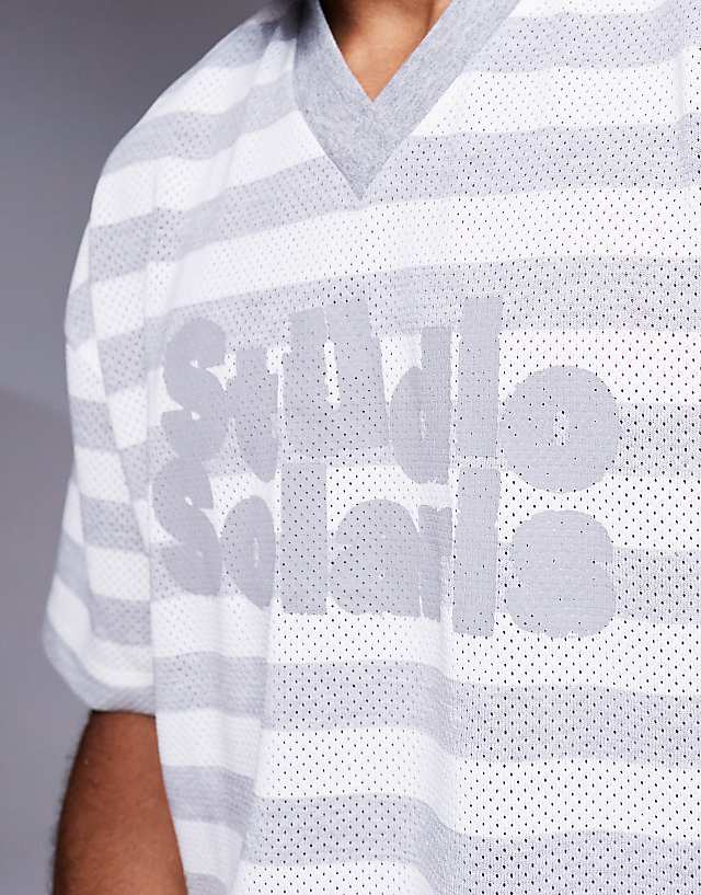 Asos ASOS DESIGN Boxy Oversized T-shirt With V-neck And Text Graphic In Textured Stripe