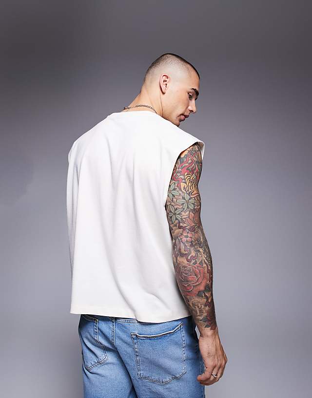 Asos ASOS DESIGN Boxy Oversized Tank With Sports Text Graphic In Cream