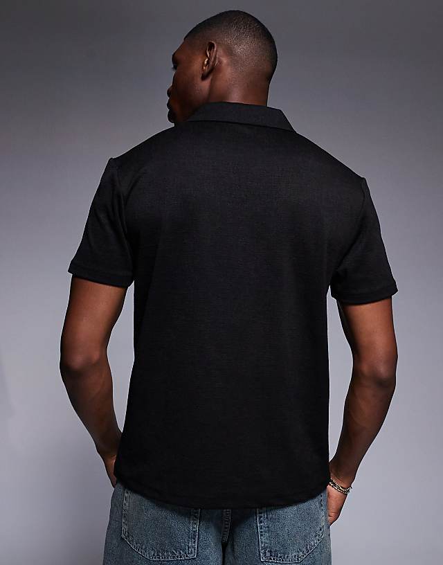 Asos ASOS DESIGN Boxy Polo With Deep Neckline In Black Texture