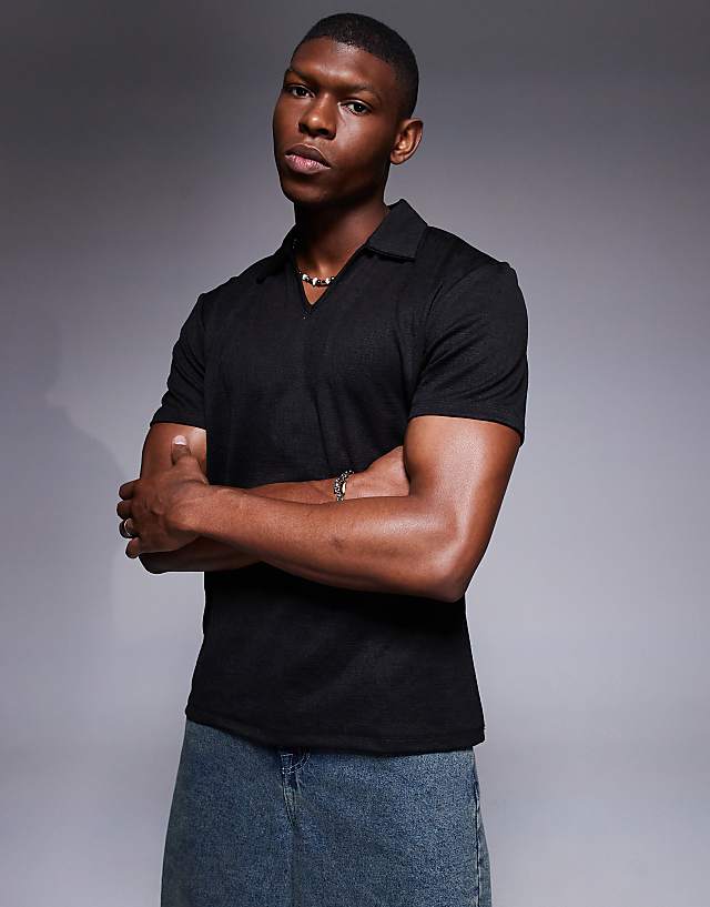 asos ASOS DESIGN boxy polo with deep neckline in black texture